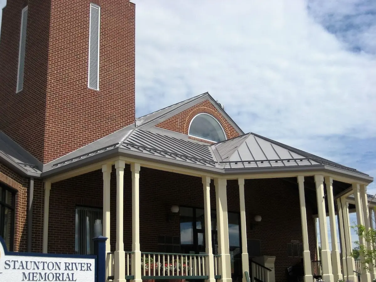 Skilled roofing craftsmen working on a residential roof in Church Hill